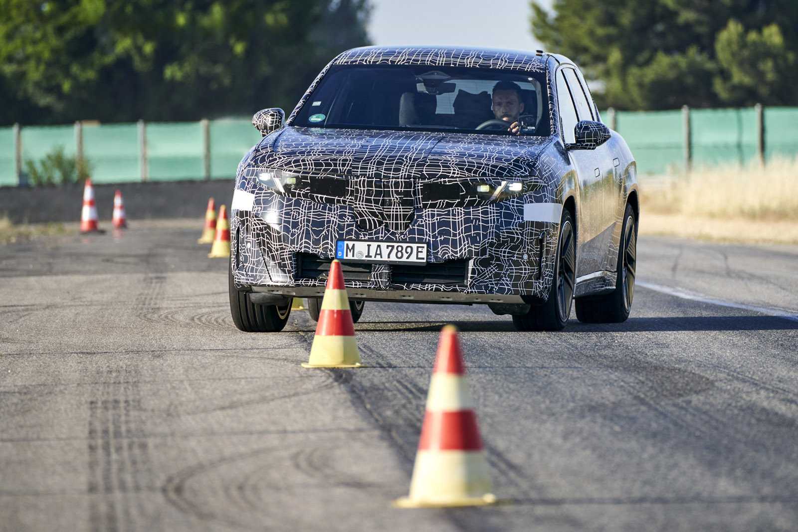 06 BMW iX3 Neue Klasse 2025 Autocar review front cornering slalom