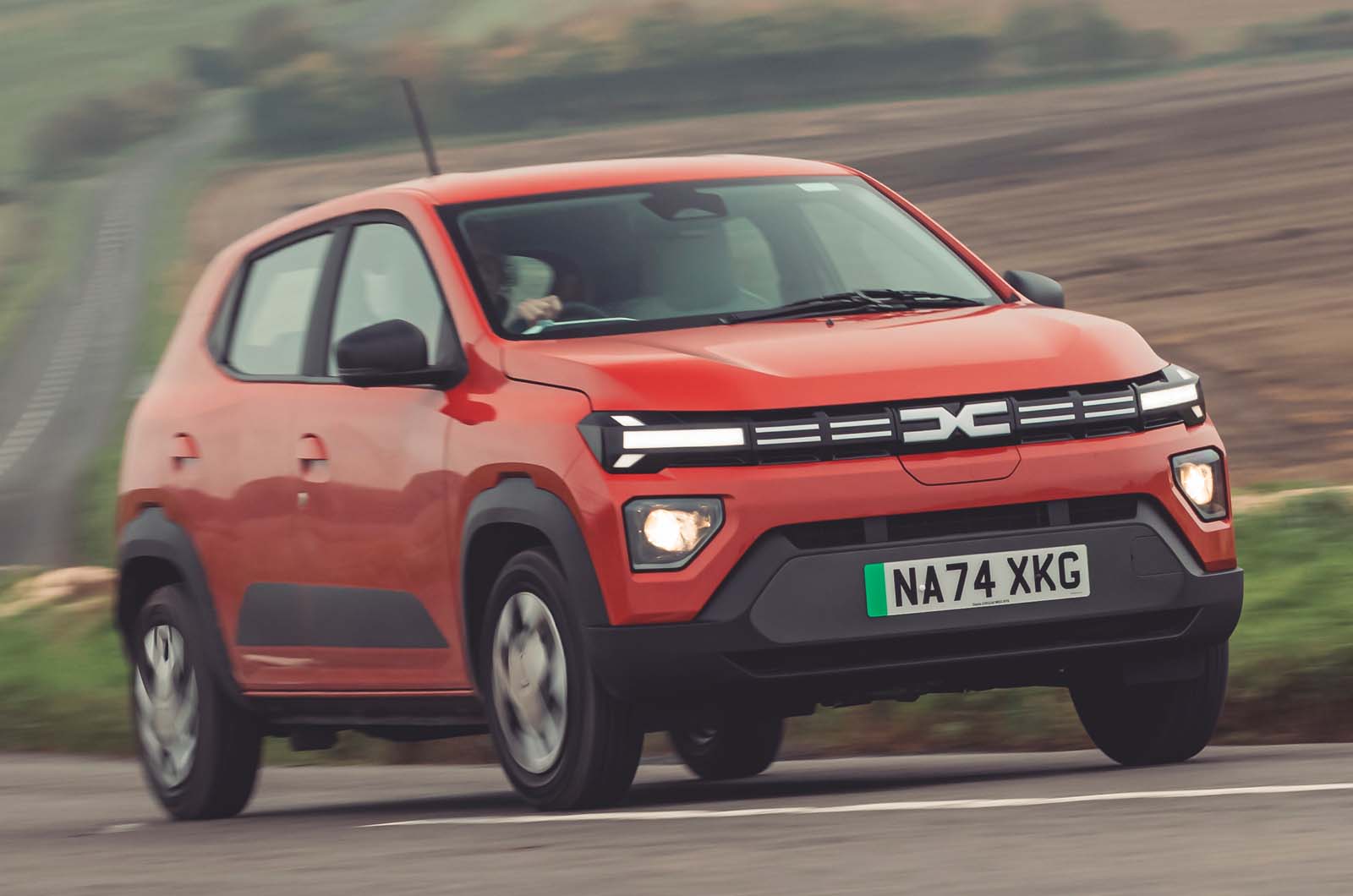 https://images.cdn.autocar.co.uk/Dacia Spring front cornering