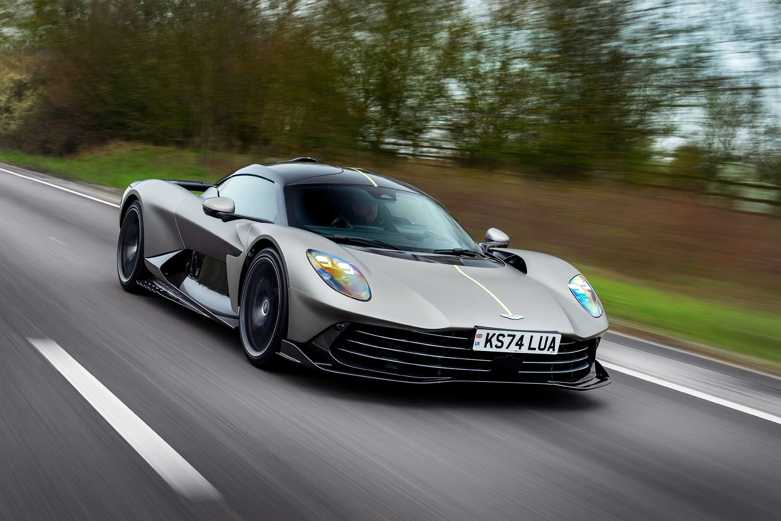Aston Martin has delayed deliveries of its new supercar and warned of huge losses for 2025
