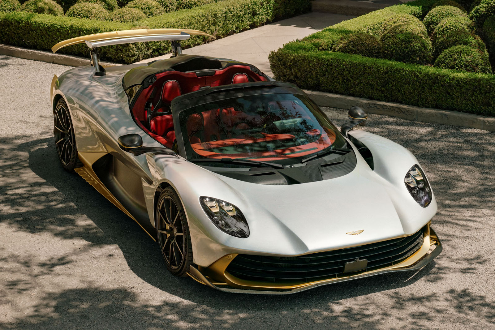Watch your wig: Aston Martin's new convertible will do 217mph with the roof down