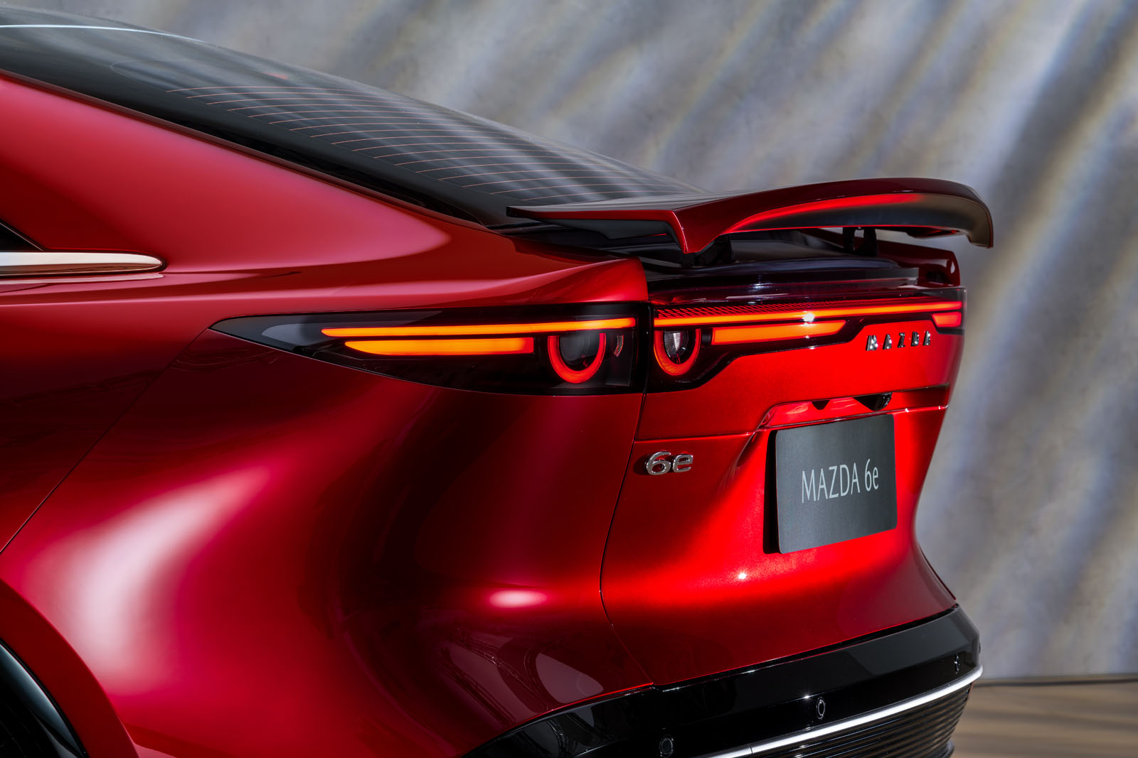 mazda-6e-2026-rear-spoiler-raised.jpg