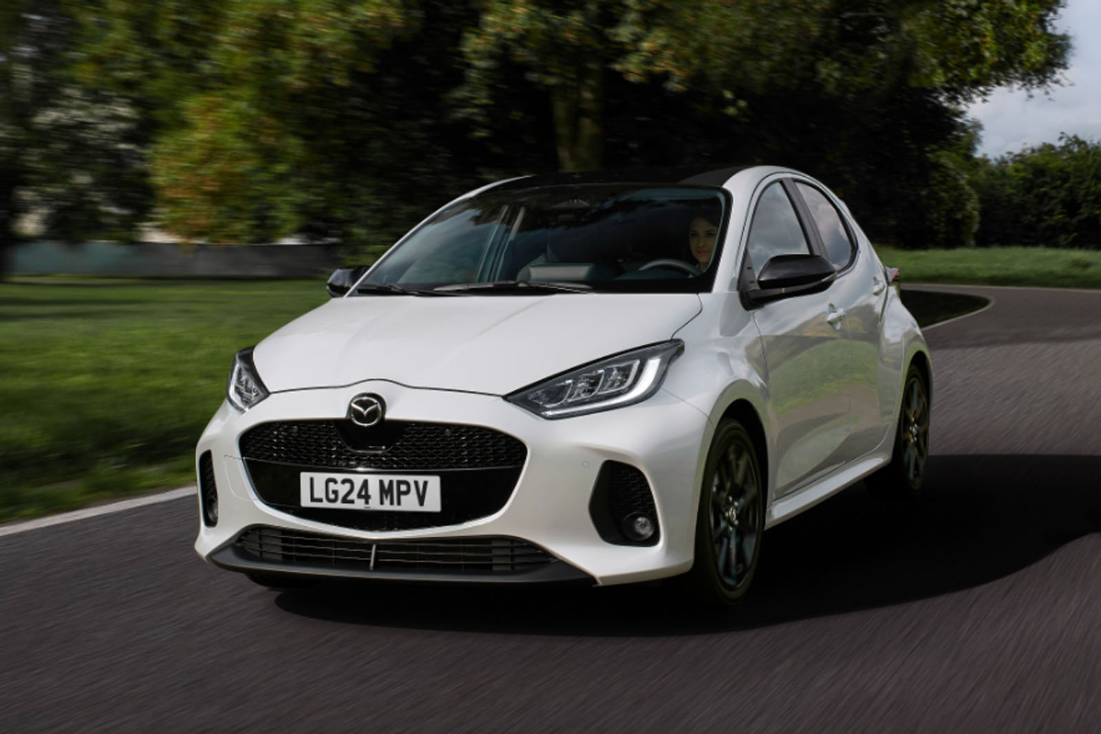 https://images.cdn.autocar.co.uk/Mazda 2 Hybrid front driving