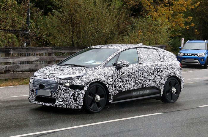 Audi prototype camo front quarter tracking wide
