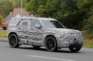 Land Rover Defender Sport camo sep 2025 front quarter tracking