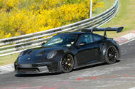 Porsche 911 GT2 RS prototype at the Nurburgring cornering side Porsche 911 GT2 RS prototype at the Nurburgring cornering side
