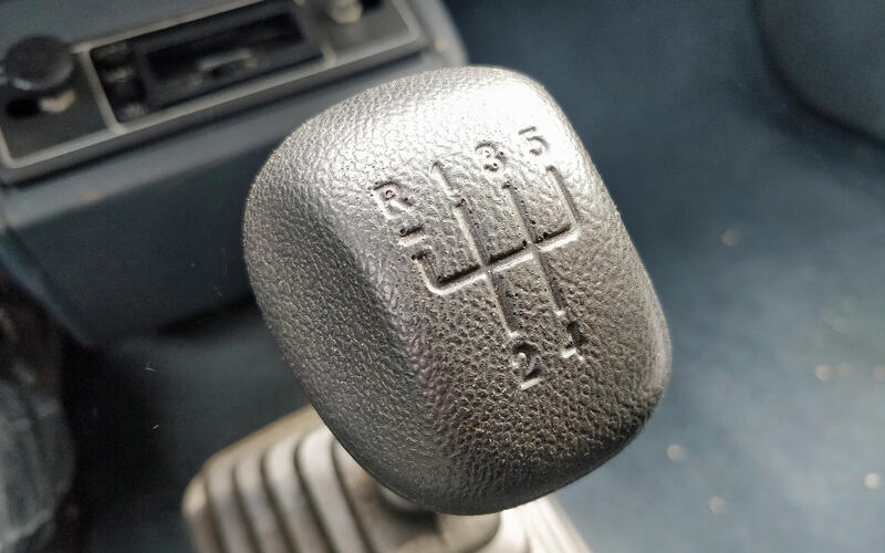 Shifting into reverse while moving forward