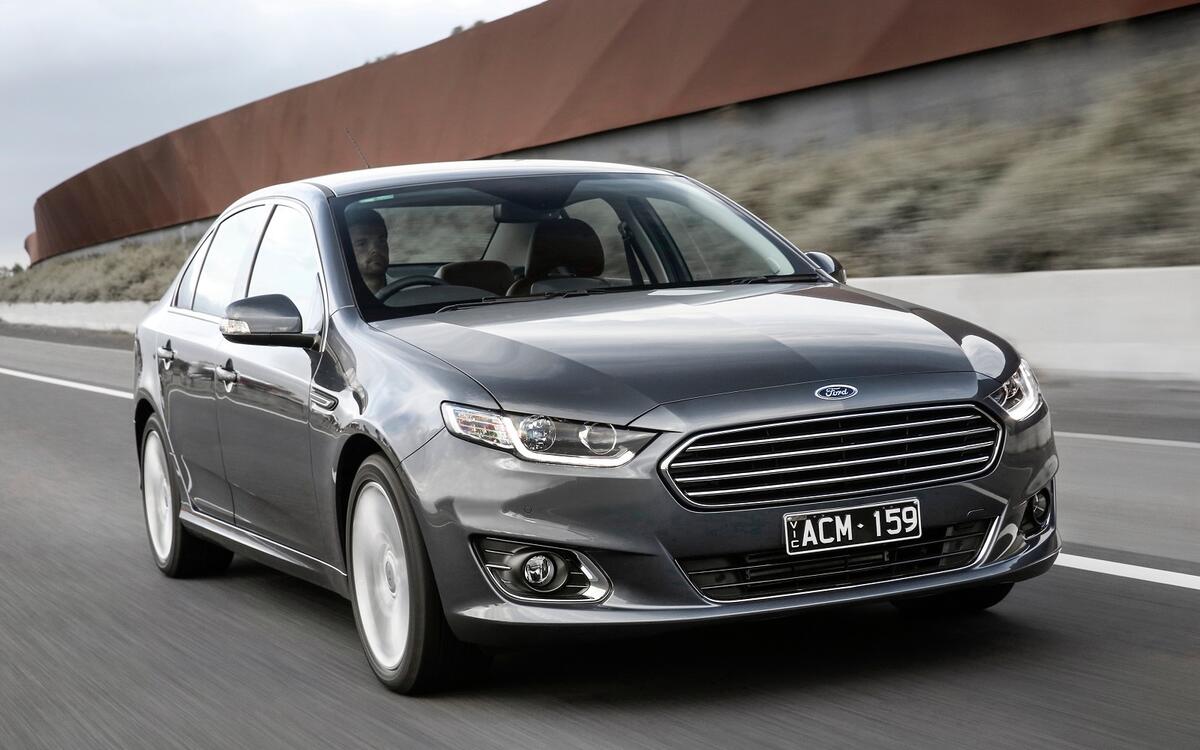 Ford Falcon vs. Holden Commodore Ford Falcon vs. Holden Commodore