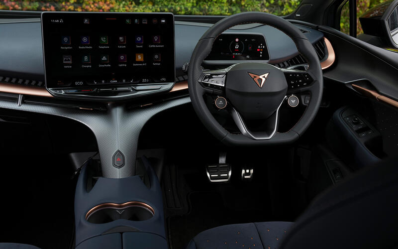 An interior shot of the CUPRA Tavascan showing the dashboard and central spine