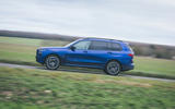 03 BMW X7 M60i RT 2023 side driving 03 BMW X7 M60i RT 2023 side driving