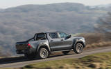 04 Toyota Hilux GR Sport RT 2023 rear driving 04 Toyota Hilux GR Sport RT 2023 rear driving