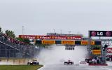 Button triumphs in Canada classic