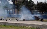 Racer unhurt in huge crash - pics