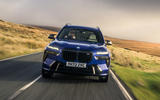 20 BMW X7 M60i RT 2023 driving front 20 BMW X7 M60i RT 2023 driving front