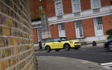 2024 Mini Cooper C 3dr in yellow   driving through town, front side