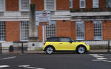 2024 Mini Cooper C 3dr in yellow   driving through town, side