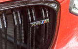 BMW X4 M Competition 2019 road test review - front badge