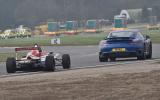 Porsche's 911 Turbo S takes on an F4 racer