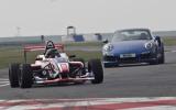 no title Porsche's 911 Turbo S takes on an F4 racer