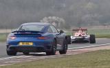 no title Porsche's 911 Turbo S takes on an F4 racer