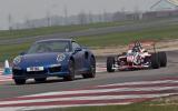 no title Porsche's 911 Turbo S takes on an F4 racer
