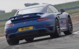no title Porsche's 911 Turbo S takes on an F4 racer