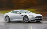 On damp roads the Aston Martin DBS will spin its rear tyres in third gear Aston Martin DBS cornering