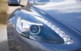 Neat LED daytime running lights fit on the inside of each headlight Aston Martin Rapide distinctive lights