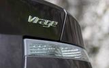Virage is intentionally more understated than the DBS, so the rear lip is less overt and there is none of the chrome highlights. We think it looks all the prettier for it Aston Martin Virage badging