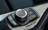 BMW's ConnectedDrive multimedia options allow you to update Facebook and Twitter accounts BMW iDrive infotainment controls
