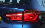 The LED tail lights on the BMW X1 illuminate in a line to make the car appear wider