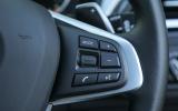 Some of the audio controls on the BMW X1's steering wheel