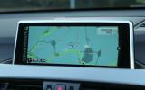 A close up of the widescreen iDrive screen in the BMW X1