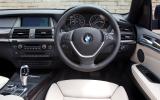 The business end of the cabin is modern-looking and clutter free BMW X5 interior