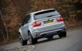 Hydraulically adjusted anti-roll bars counteract cornering forces to keep the car level  BMW X5 rear cornering