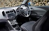 Cubbies on each side of the centre console ramp up the number of receptacles Chevrolet Aveo interior