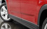 To take some of the blockiness of the doors away, there's a gently rising strake on the bottom half Chevrolet Orlando side skirts