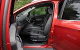 Leather seats are comfortable, if a little flat. It’s spacious up front… Ford Kuga front seats