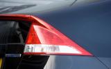 The top half of the body tapers in towards the rear of the car, which helps the air pass more smoothly over the top Honda Insight rear light