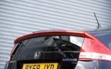 Like the Prius, the Insight’s slippery shape demands a high-reaching and near-vertical tail Honda Insight Prius-styled tail