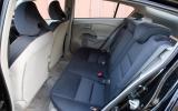 Headroom suffers slightly in the rear, but the seats are spacious for two adults Honda Insight rear seats
