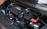 Honda’s approach to building a hybrid, that of a parallel system, carries advantages in terms of weight, space and cost Honda Insight hybrid engine
