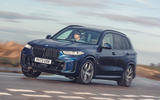 01 bmw x5 xdrive50e review 2024 lead front cornering 01 bmw x5 xdrive50e review 2024 lead front cornering