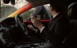 LED lights on the window sills, dashboard and windscreen pillars glow amber then red as the bike approaches