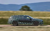 03 Skoda Superb estate prototype FD 2023 side driving 03 Skoda Superb estate prototype FD 2023 side driving