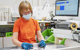 Car factory worker in PPE