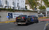 Dark van towing black car Dark van towing black car