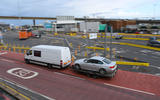 White van towing Mercedes