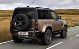 Land Rover Defender 90 on the road rear