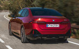 2023 BMW i5 rear three quarter tracking