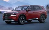 2023 Nissan X trail reveal red outside front three quarters 2023 Nissan X trail reveal red outside front three quarters